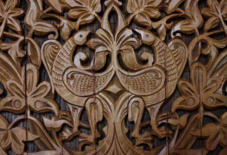 Folk Art - brown wooden tribal carved wall decor