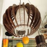 Wooden Lamp - a bunch of lights that are hanging from a ceiling