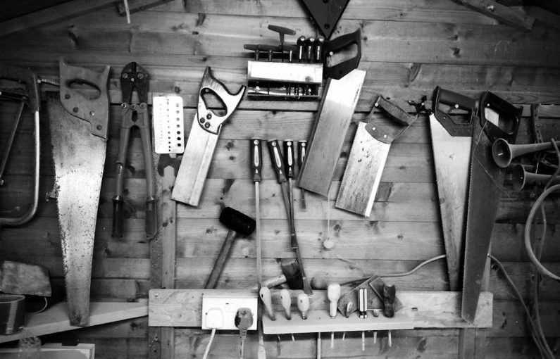 Mallet Wood - grayscale photography of arranged assorted hand tools