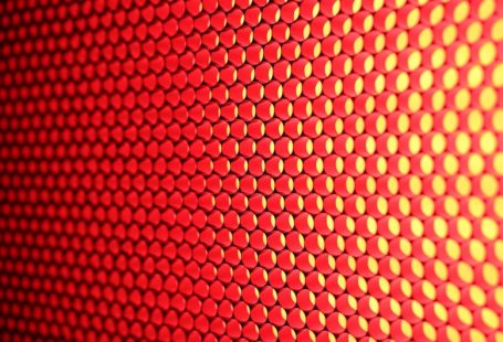 Texture Combs - a close up of a red and yellow background